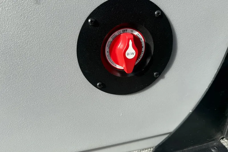 Slide: The Image of Red control switch on 2026 Bentley Pontoons Bolt 223 boat panel. - 7