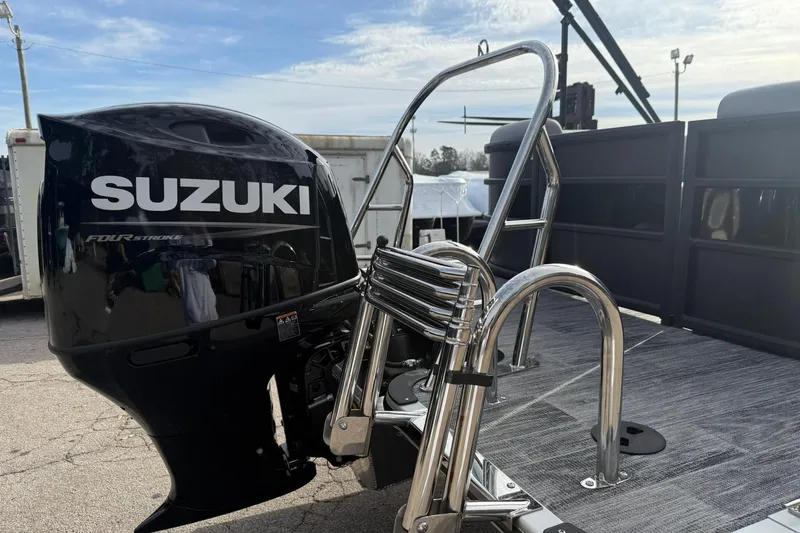 Slide: The Image of 2026 Bentley Pontoons Bolt 223 with Suzuki outboard motor and stainless steel ladder. - 9