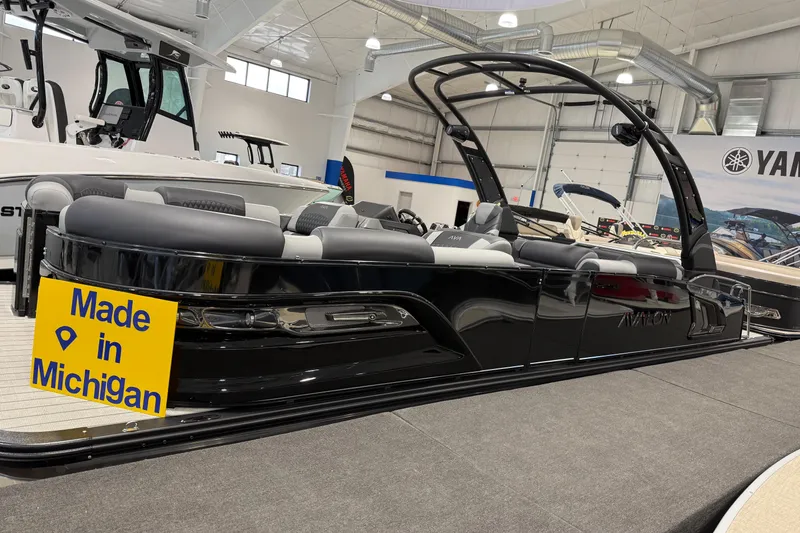 The Image of 2026 Avalon 2585 EXCALIBUR LTD FL luxury pontoon boat displayed indoors. - 0