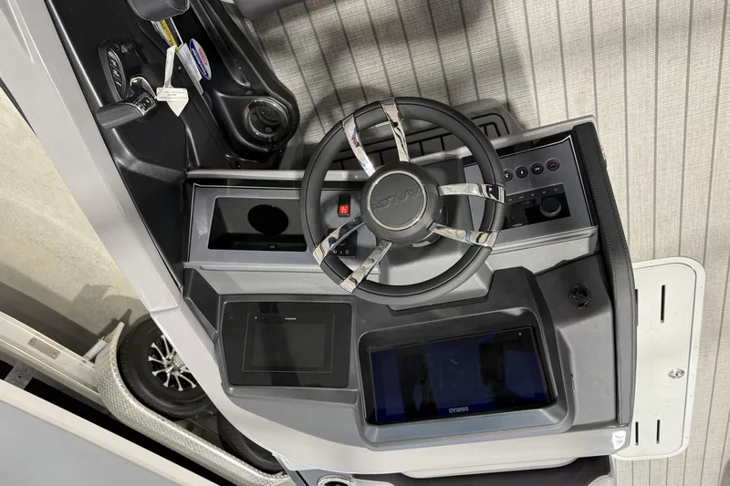 Slide: The Image of Steering console of 2026 Avalon 2585 EXCALIBUR LTD FL boat with modern controls. - 5