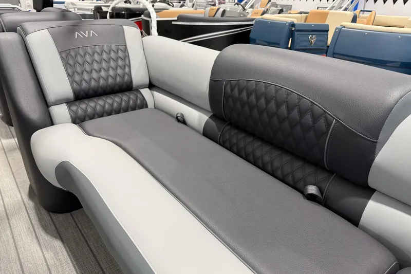 Slide: The Image of Luxurious seating in the 2026 Avalon 2585 EXCALIBUR LTD FL boat, featuring elegant diamond stitching. - 7