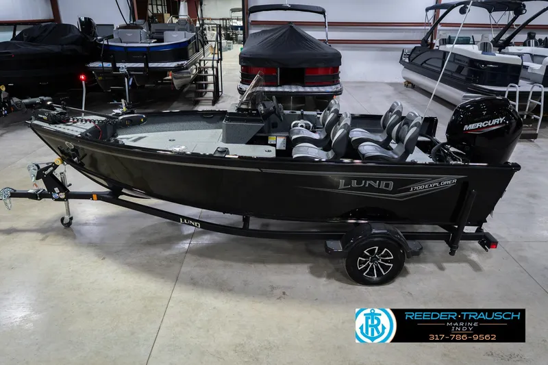 The Image of 2026 Lund 1700 Explorer SS boat with Mercury engine in showroom. - 2