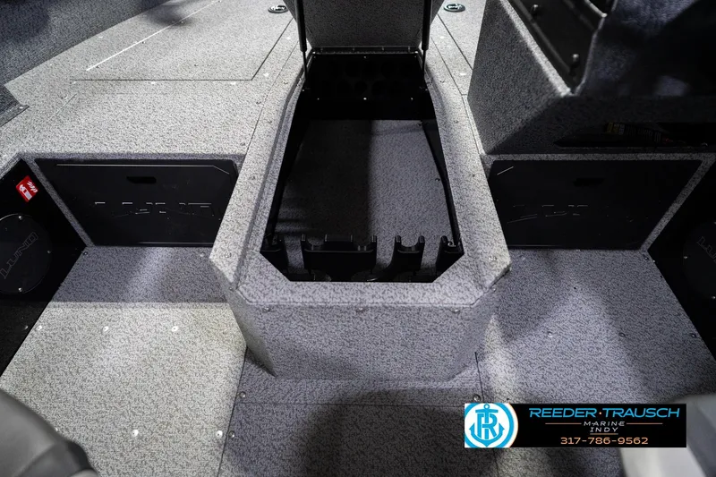 Slide: The Image of Interior of 2026 Lund 1700 Explorer SS boat showing storage compartments and flooring. - 27