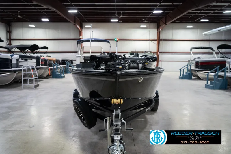 Slide: The Image of 2026 Lund 1700 Explorer SS boat in showroom, front view, Reeder-Trausch Marine. - 4