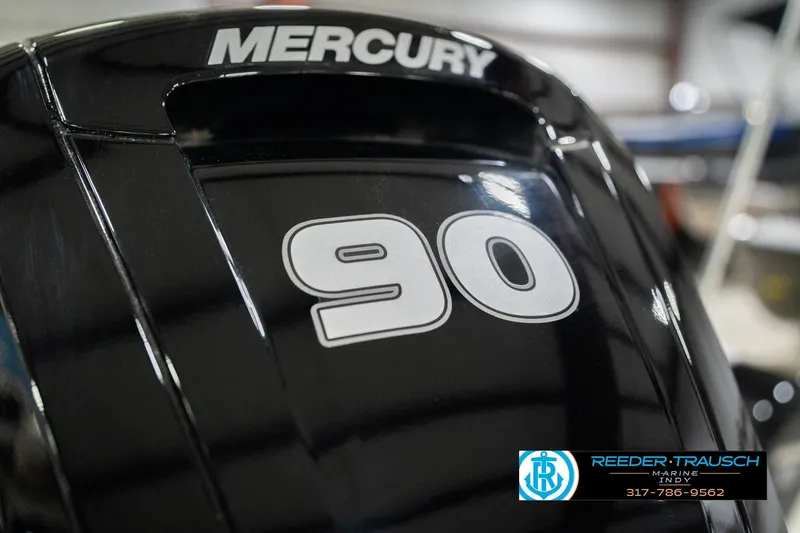 Slide: The Image of Close-up of a Mercury 90 outboard motor on a 2026 Lund 1700 Explorer SS boat. - 46