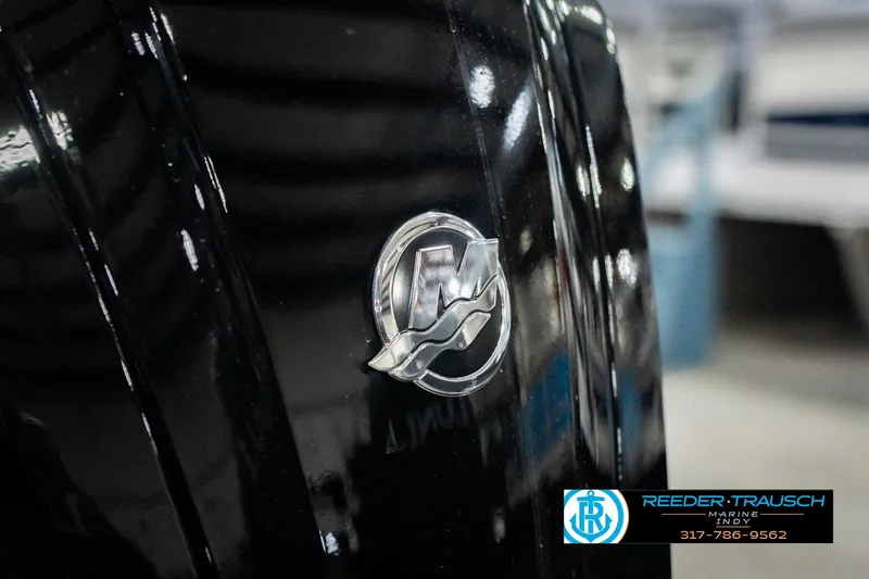 Slide: The Image of 2026 Lund 1700 Explorer SS boat with a shiny black exterior and emblem. - 47