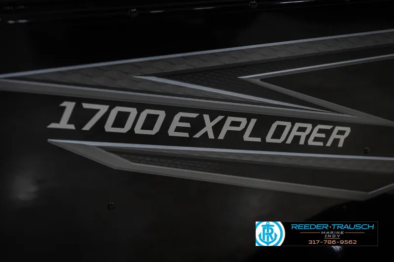 Slide: The Image of 2026 Lund 1700 Explorer SS boat logo with sleek design and branding. - 54