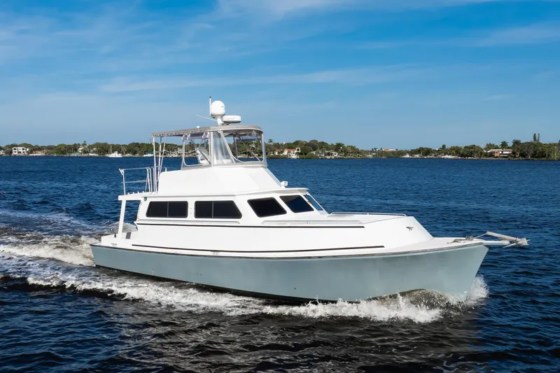 Slide: The Image of 2014 Chesapeake 46 Trawler cruising on a sunny day in open waters. - 34