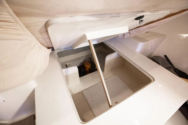 Slide: The Image of Open storage compartment in 2014 Chesapeake 46 Trawler interior, showcasing practical design. - 6