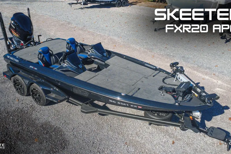 The Image of 2021 Skeeter FXR20 Apex bass boat on trailer, featuring dual seats and modern design. - 1