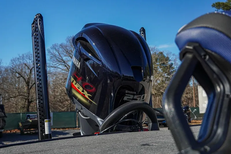 Slide: The Image of 2021 Skeeter FXR20 Apex with Yamaha 250 engine, outdoor setting. - 11