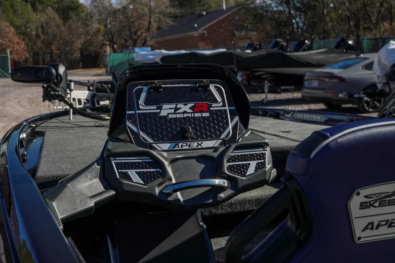 Slide: The Image of 2021 Skeeter FXR20 Apex boat interior with FXR Series branding and Skeeter logo. - 14
