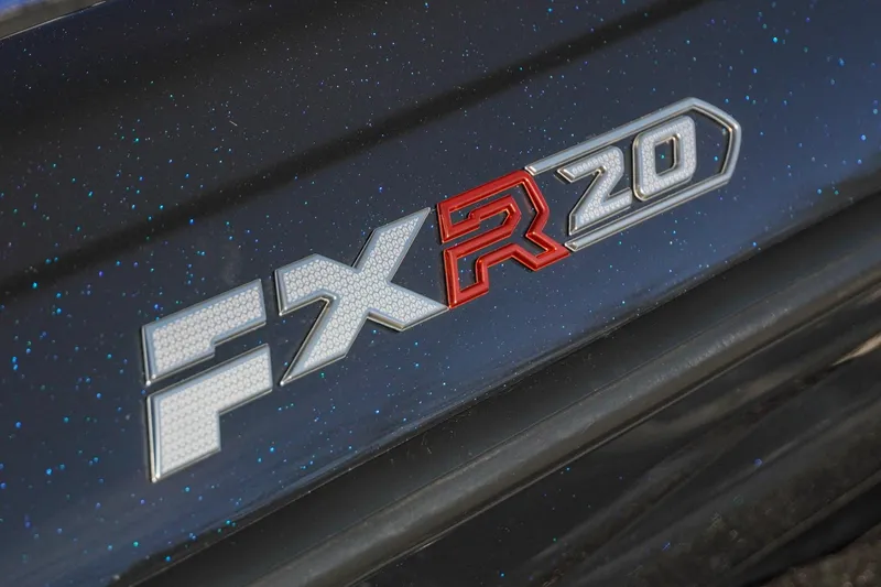Slide: The Image of 2021 Skeeter FXR20 Apex logo on a sparkling dark surface. - 15