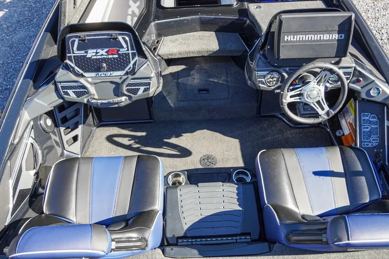 Slide: The Image of 2021 Skeeter FXR20 Apex boat interior with dual seats and advanced navigation controls. - 22