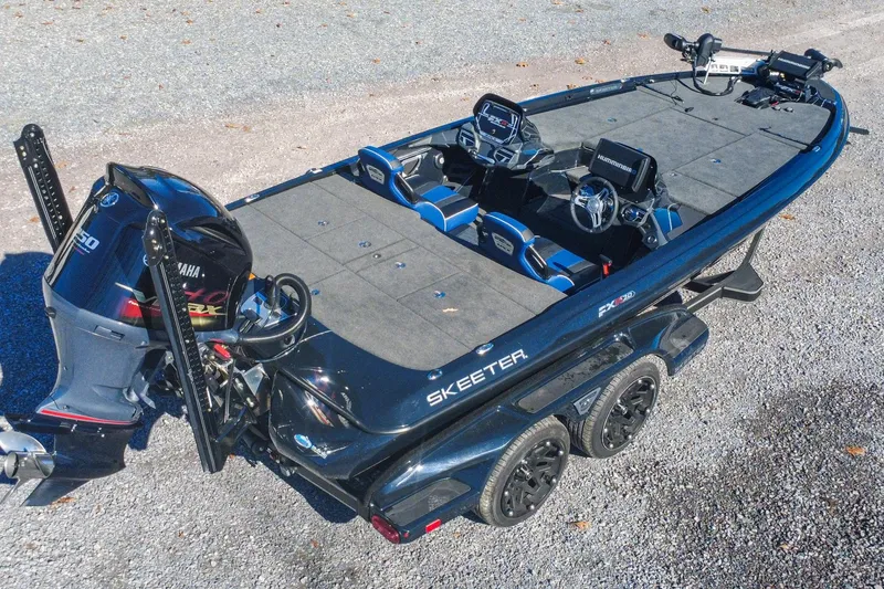 Slide: The Image of 2021 Skeeter FXR20 Apex fishing boat with Yamaha engine, dual consoles, and advanced electronics. - 3