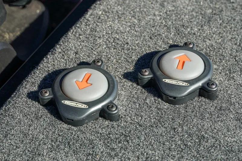 Slide: The Image of Power-Pole buttons on 2021 Skeeter FXR20 Apex boat deck. - 32