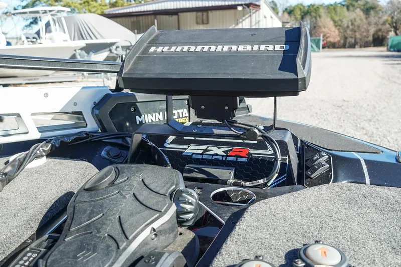 Slide: The Image of 2021 Skeeter FXR20 Apex boat dashboard with Humminbird and Minn Kota electronics. - 34