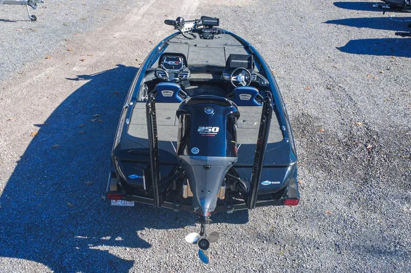 Slide: The Image of 2021 Skeeter FXR20 Apex boat with Yamaha 250 engine, parked on gravel. - 4