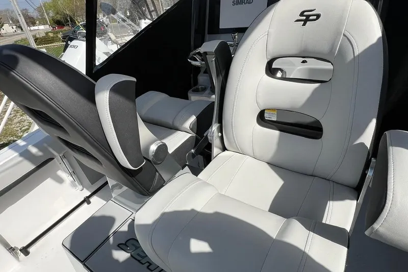 Slide: The Image of 2026 Sea Pro 245FLX Sandbar boat interior with luxurious seating and modern design. - 18