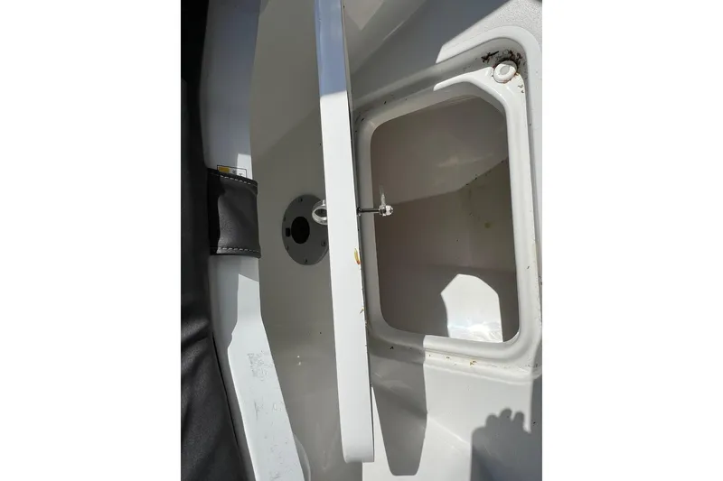 Slide: The Image of Open storage compartment on a 2026 Sea Pro 245FLX Sandbar boat. - 25