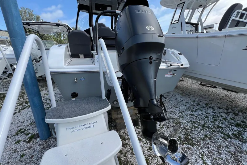 Slide: The Image of 2026 Sea Pro 245FLX Sandbar boat with powerful outboard motor, viewed from rear. - 9