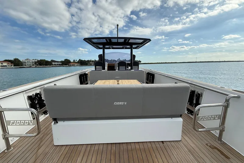 Slide: The Image of 2013 Fjord 40' Open yacht with spacious deck and seating, cruising on calm waters. - 35