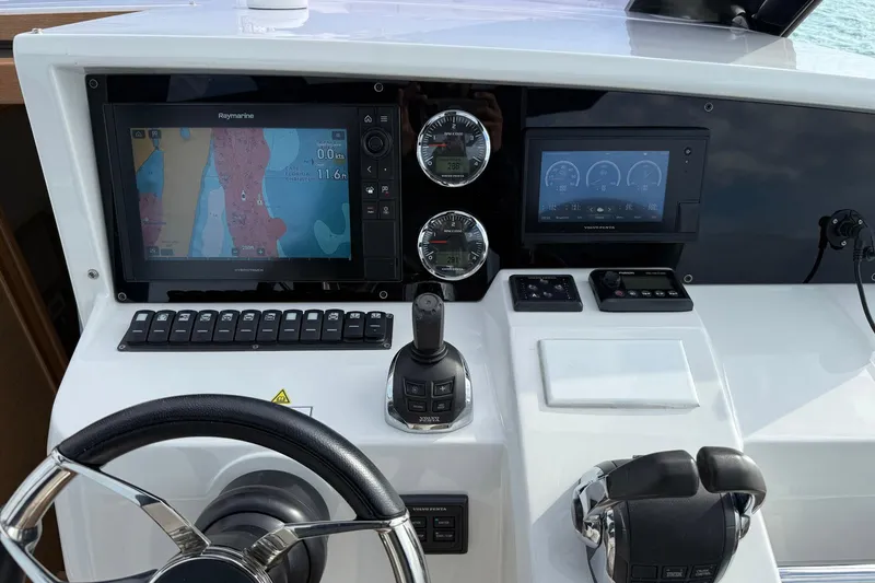 Slide: The Image of Helm of 2013 Fjord 40' Open with navigation and control systems. - 37