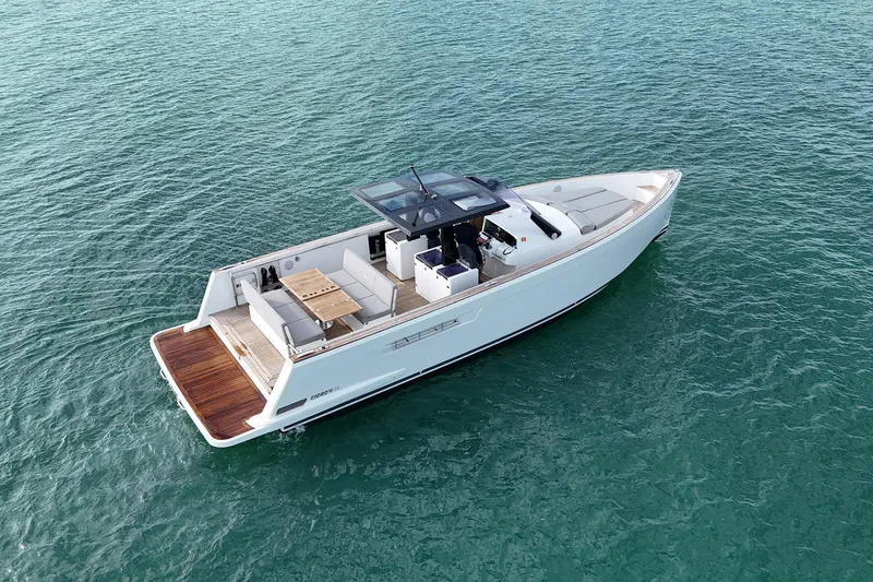 Slide: The Image of 2013 Fjord 40' Open yacht cruising on clear blue water. - 4