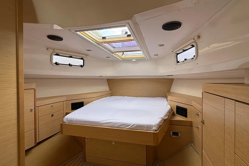 Slide: The Image of Luxurious cabin interior of 2013 Fjord 40' Open yacht with skylight and wood finish. - 41
