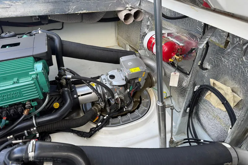 Slide: The Image of Engine compartment of a 2013 Fjord 40' Open boat, featuring Volvo Penta components. - 75