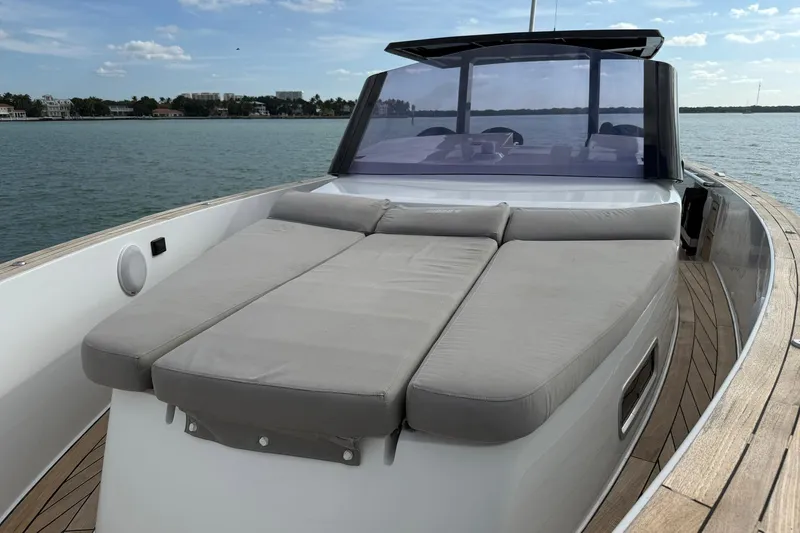 Slide: The Image of 2013 Fjord 40' Open yacht with spacious sunbed on deck, cruising on calm waters. - 81