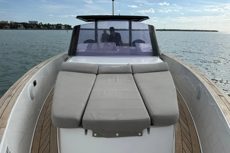 Slide: The Image of 2013 Fjord 40' Open yacht with sunbed, cruising on calm waters. - 82