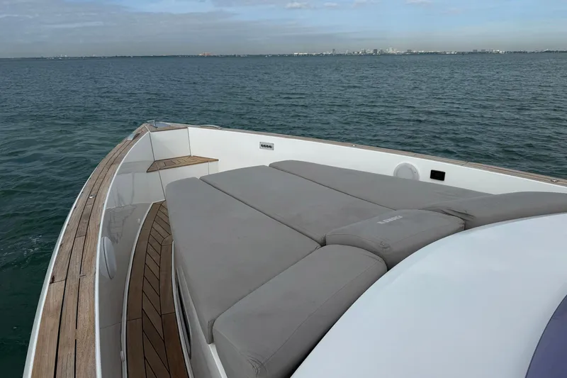 Slide: The Image of 2013 Fjord 40' Open yacht with spacious deck and sunbathing area on calm waters. - 83