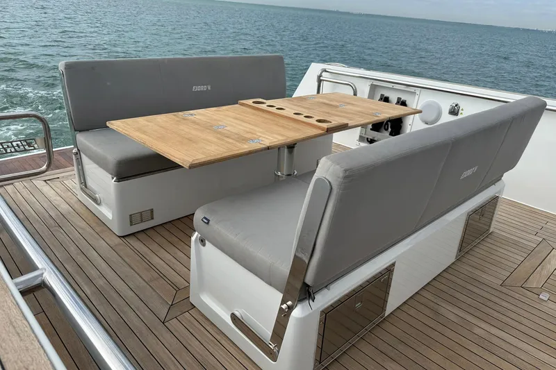 Slide: The Image of 2013 Fjord 40' Open yacht with teak deck and seating area on the ocean. - 84