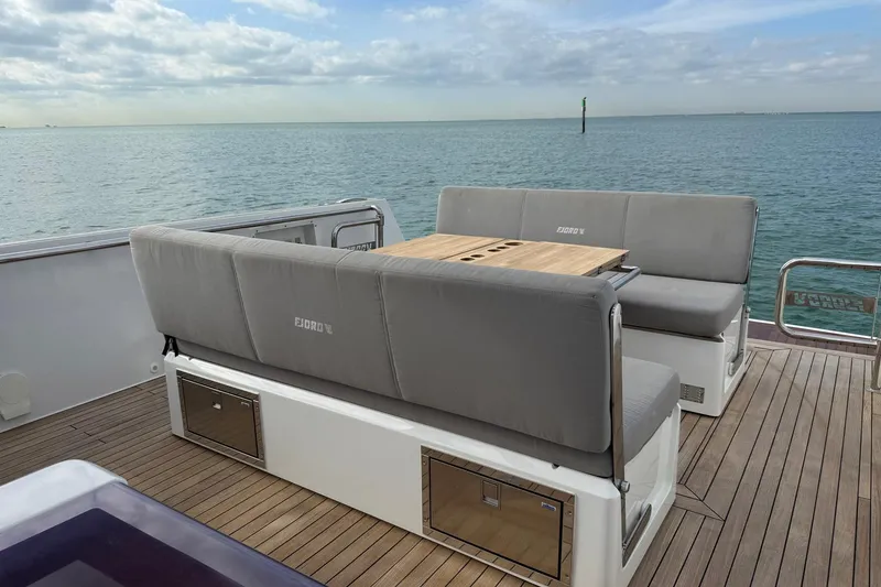 Slide: The Image of Luxury seating area on 2013 Fjord 40' Open yacht with ocean view. - 91