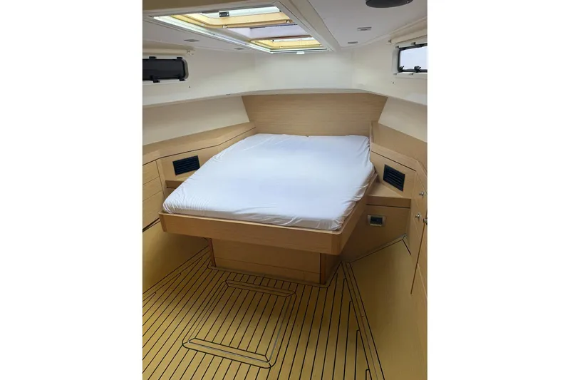 Slide: The Image of Interior cabin of 2013 Fjord 40' Open yacht with bed and wooden finish. - 93