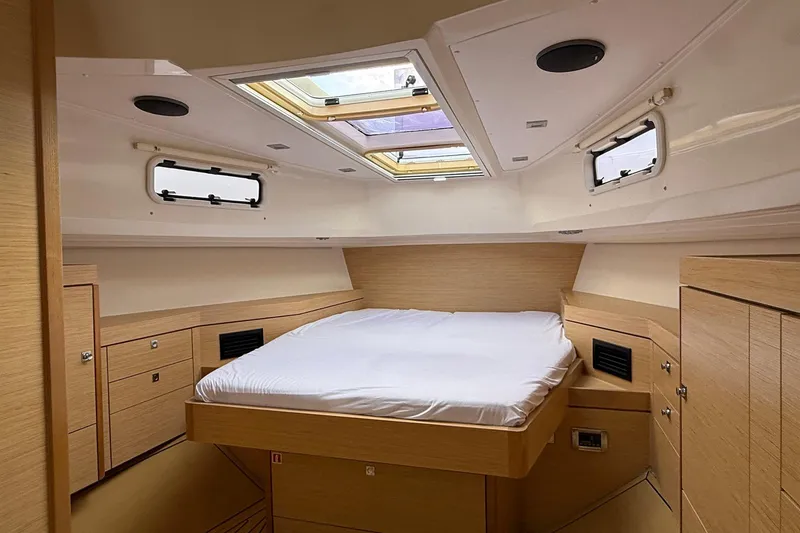 Slide: The Image of Luxurious cabin interior of 2013 Fjord 40' Open yacht with skylights and wood finish. - 94