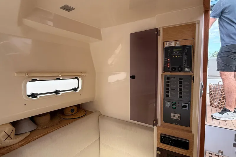 Slide: The Image of Interior of 2013 Fjord 40' Open yacht with control panel and seating area. - 99