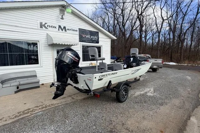 Slide: The Image of 2026 Crestliner 1700 Storm boat outside Knox Marine dealership. - 3