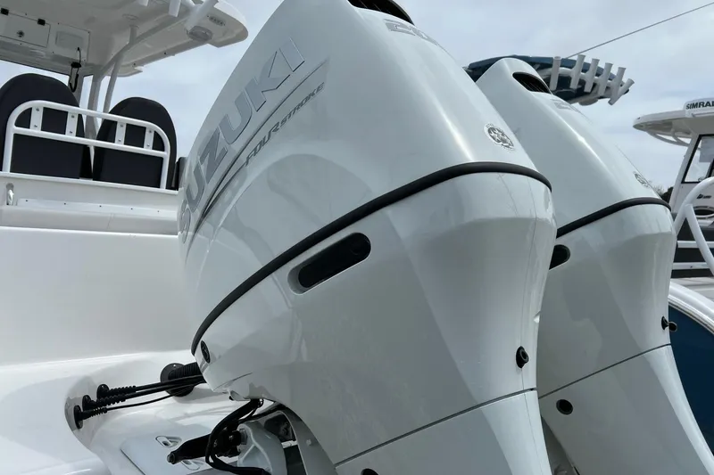 Slide: The Image of Twin Suzuki outboard engines on a 2026 Sea Pro 262 Offshore boat. - 21