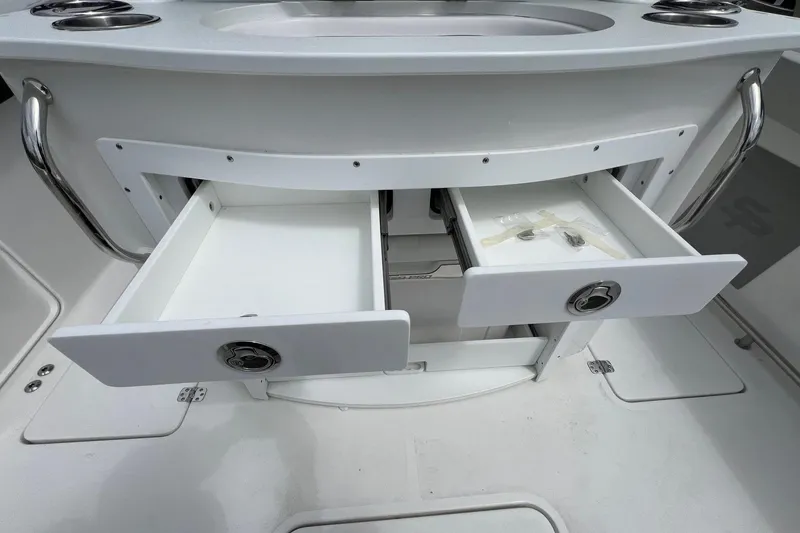 Slide: The Image of Open storage drawers on a 2026 Sea Pro 262 Offshore boat. - 34
