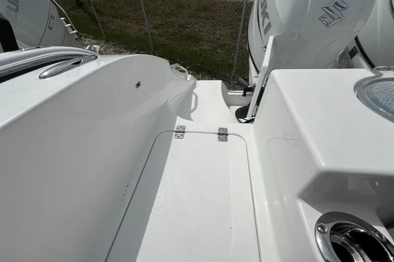 Slide: The Image of 2026 Sea Pro 262 Offshore boat deck with Suzuki engines, showcasing sleek design and functionality. - 41