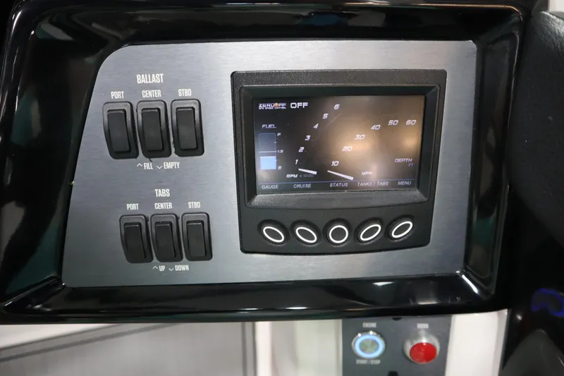 Slide: The Image of 2020 MasterCraft NXT22 dashboard with ballast and tab controls, digital display. - 12