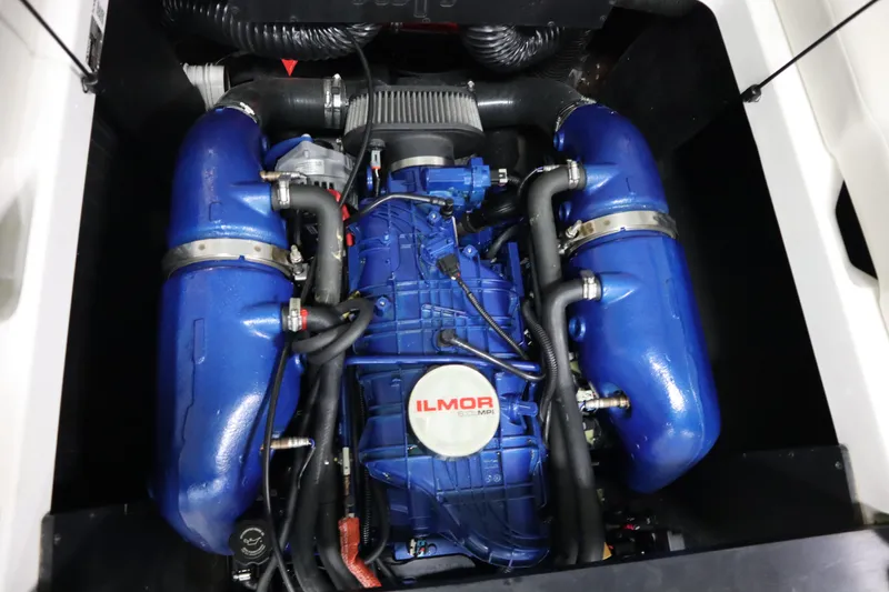 Slide: The Image of 2020 MasterCraft NXT22 Ilmor engine, blue components, detailed view. - 23