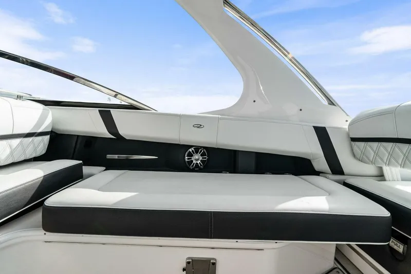 Slide: The Image of 2023 Regal 29 OBX boat interior with sleek seating and modern design. - 10