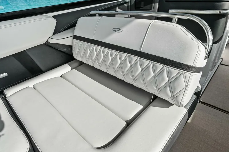 Slide: The Image of Luxurious seating on 2023 Regal 29 OBX boat with elegant white upholstery. - 21