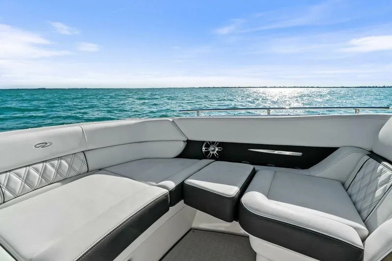Slide: The Image of Luxurious seating on 2023 Regal 29 OBX boat with ocean view. - 26