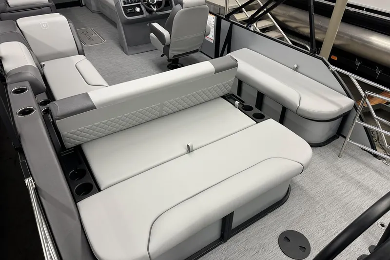 Slide: The Image of 2026 Godfrey Sweetwater 2486 SFL boat interior with luxurious seating and modern design. - 5