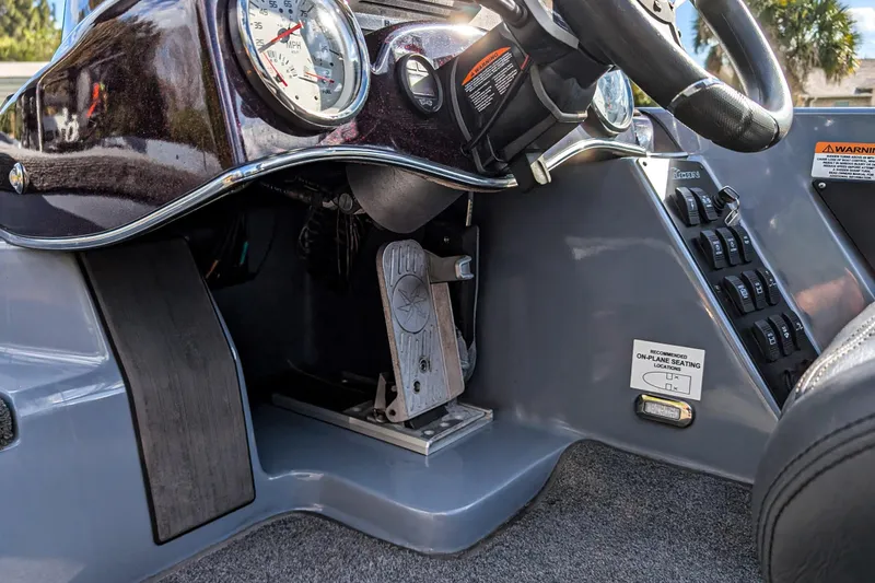 Slide: The Image of 2023 Falcon F195 boat with Minn Kota trolling motor and Humminbird fish finder on deck. - 11