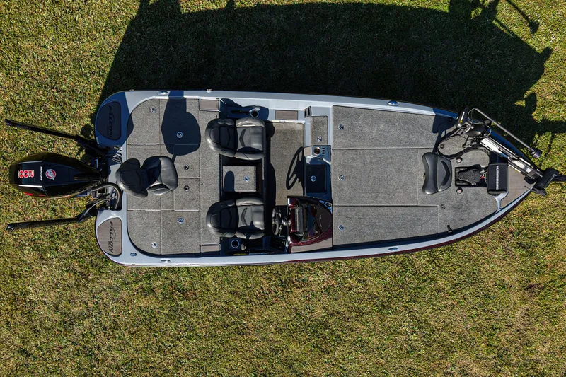 Slide: The Image of Overhead view of 2023 Falcon F195 boat on grass, showcasing seating and deck layout. - 14
